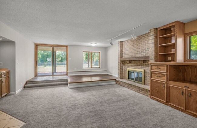 Building Photo - 6250 Larch Ln N