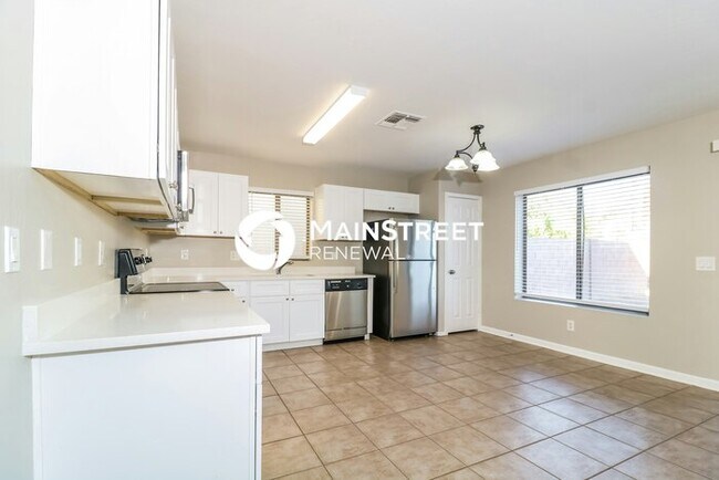 Building Photo - 4 Bedroom Pet-Friendly Home in Avondale, AZ with Main Street Renewal