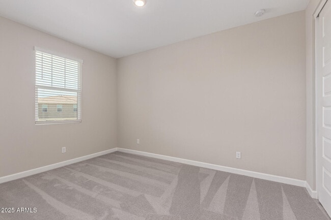 Building Photo - 5835 E Rose Garden Ln