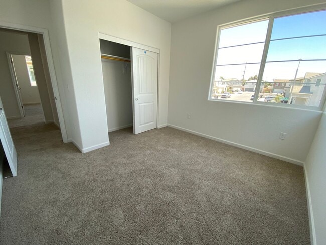 Building Photo - Be the First to Live in This Stunning New ...