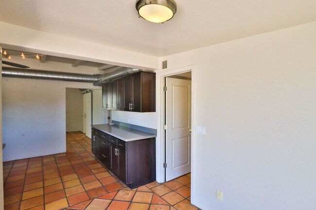 Building Photo - 3 Bedroom + den with pool