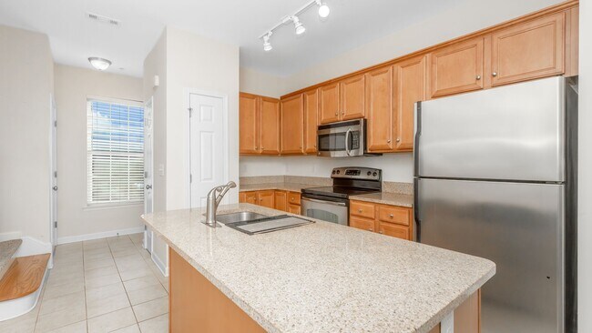 Building Photo - Located just Steps from Shopping, Dining, & Entertainment in The Market Common
