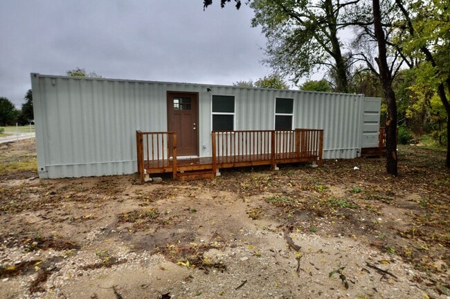 Building Photo - FOR LEASE! 1 BR - 1 BA - 325 sf - Container Home. All Utilities (Electricity, Water, Sewer & Garb...