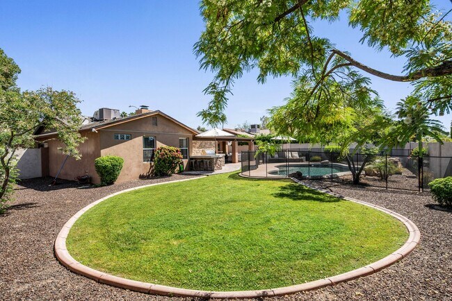 Building Photo - **STUNNING 3 BEDROOM/2 BATHROOM FULLY RENOVATED HOME IN SCOTTSDALE!! (THUNDERBIRD & 52ND ST)**