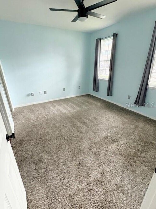 Building Photo - AVAILABLE NOW: First-floor 2-bedroom, 1-bath condo in Gated Community