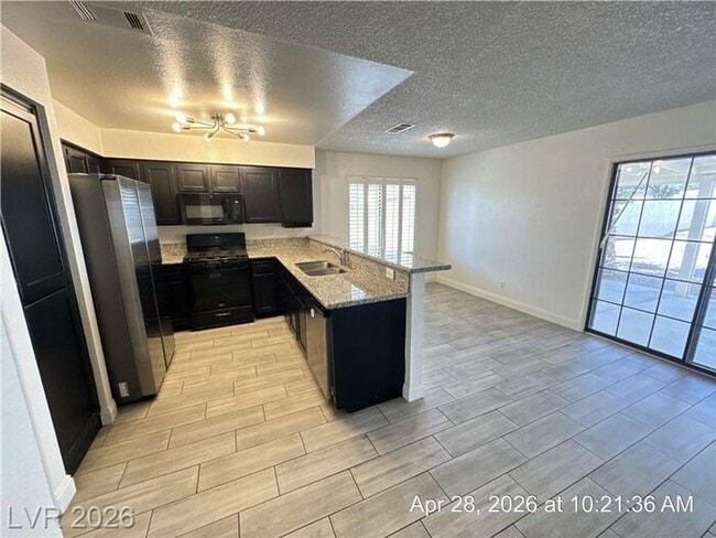 Building Photo - Updated Green Valley Home with 3-Car Garage, Granite Kitchen & Covered Patio