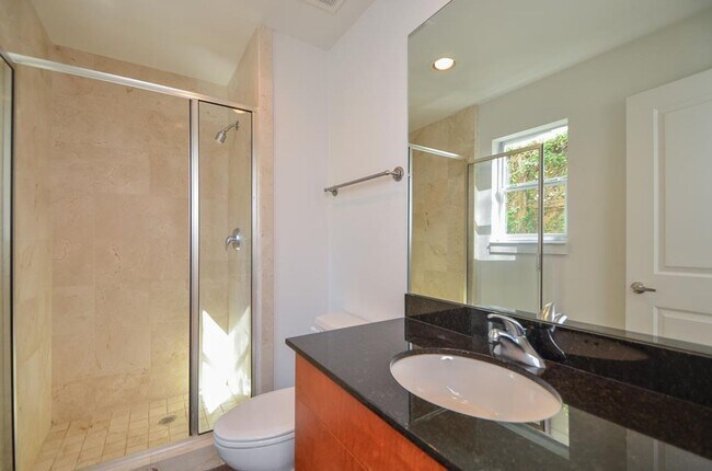 Building Photo - Stylish Corner Townhome Steps from Parks, Dining & Shopping