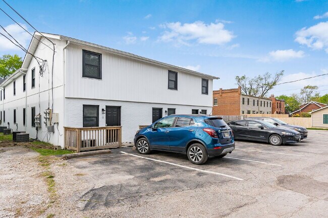 Building Photo - Half Month FREE — Updated 2BR w/ In-Unit Laundry, Central A/C + 2 Parking Spots | Touring starts ...