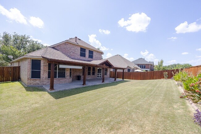 Building Photo - Spacious 4-Bedroom Home with Large Backyard in Rowlett