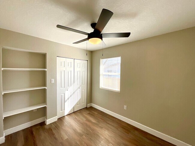 Building Photo - Modern Home With Covered Patio & Fenced Yard!