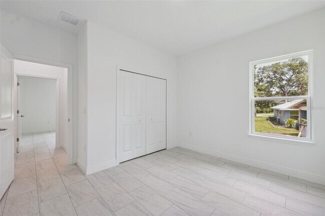 Building Photo - 10089 N Athenia Dr