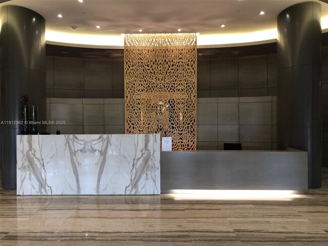 Building Photo - 10275 Collins Ave