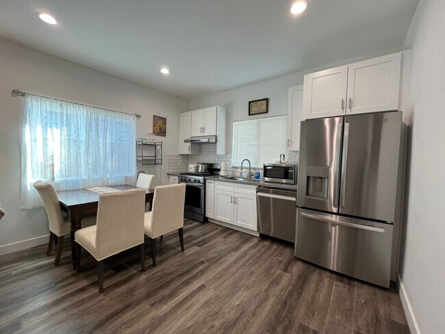 Primary Photo - Furnished 1+1 w/dishwasher + in-unit laundry!