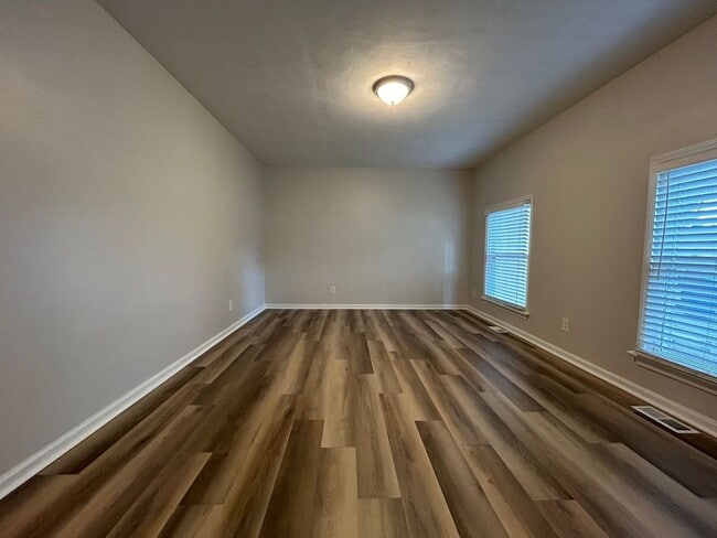 Building Photo - Welcome to this charming ranch-style home ...