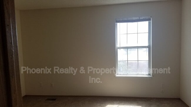 Building Photo - 1008A Milo Cir.