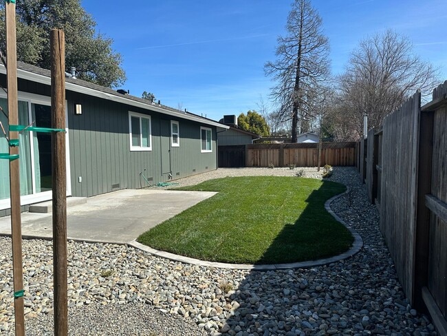 Building Photo - Updated Home with Island Kitchen, LVP Flooring, and Yard Care Included!