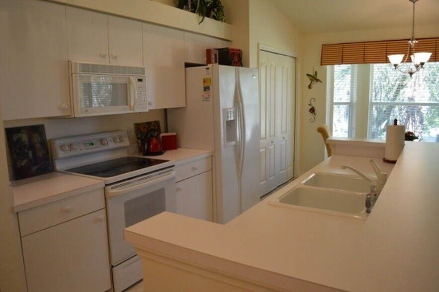 Refrigerator is french door model. - 21301 Lancaster Run
