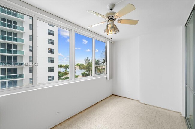 Building Photo - 5005 Collins Ave