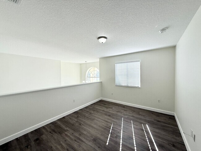 Building Photo - GORGEOUS, Large Completely Renovated Two-Story 4/2.5 PLUS LOFT in POINCIANA VILLAGES!