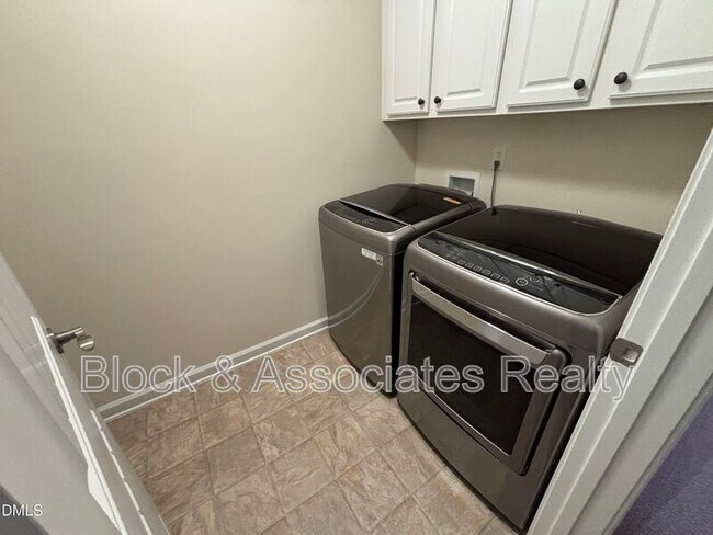 Building Photo - 1009 Magnolia Blossom Ln