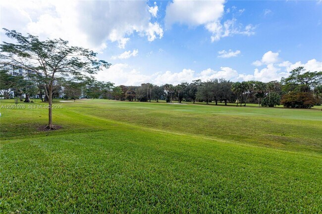 Building Photo - 4030 W Palm Aire Dr