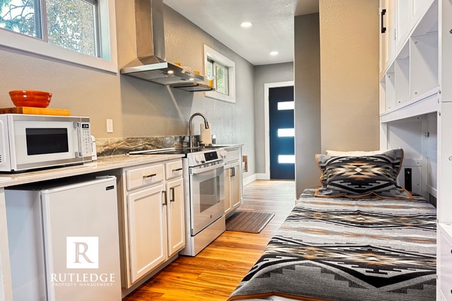 Building Photo - Modern Living / Single Furnished Studio / ...