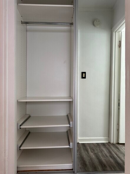 Mirrored hallway closet - 8268 Waring Ave