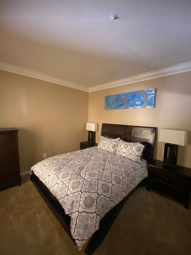 Building Photo - Fully furnished 2 bedroom unit in 24/7 guard gated community