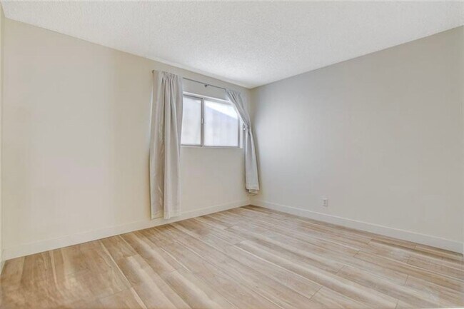 Building Photo - Completely Updated and Move-In Ready, 2 bedroom, 1 bath first floor unit!