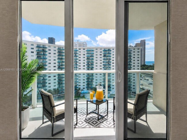 Building Photo - 19390 Collins Ave