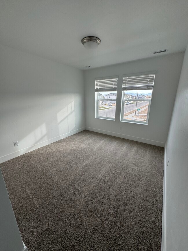 Building Photo - 6893 N Isaiah Ave