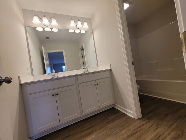 Building Photo - Welcome to our townhouse in the beautiful location of Leland, NC.