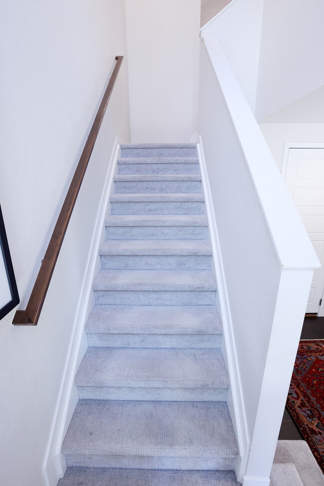 Stairs from lower level to main level. - 15637 E Broncos Pl