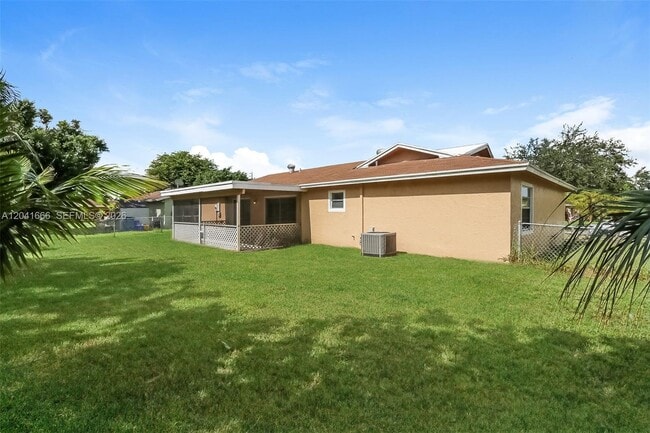 Building Photo - 830 Royal Palm Beach Blvd