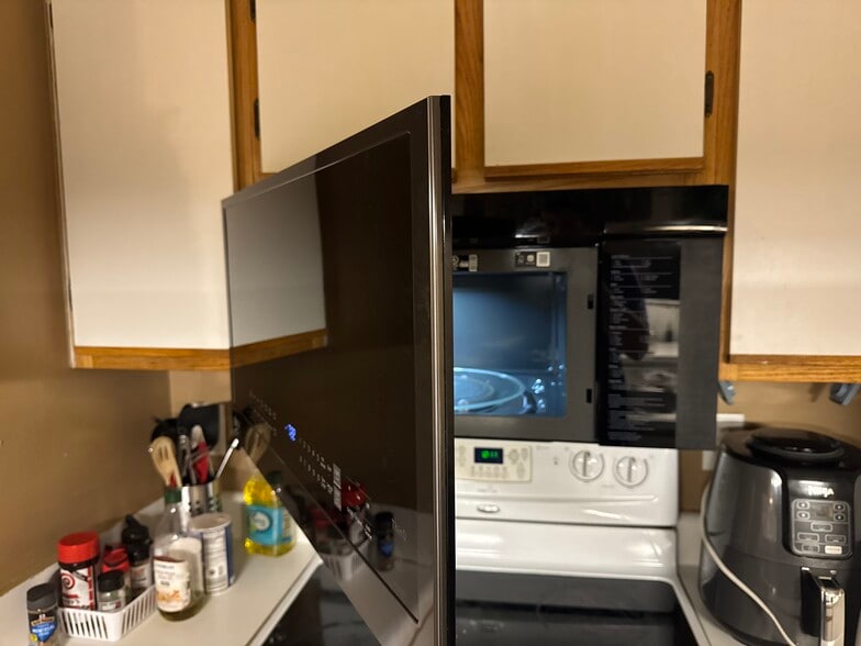 Newly install microwave - 220 Elm St