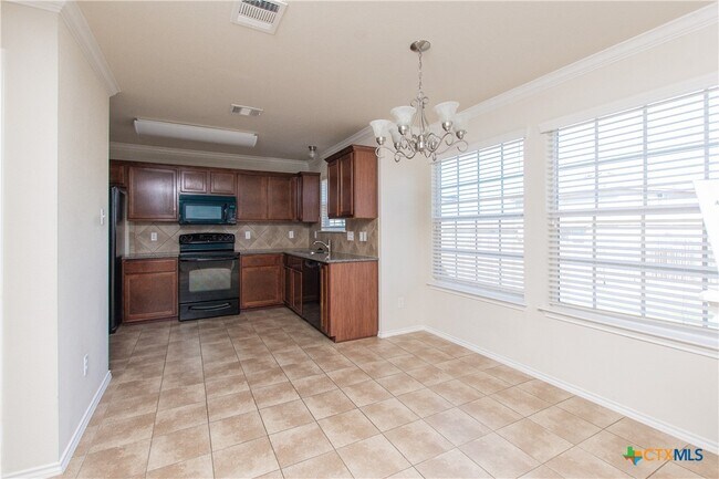 Building Photo - 4701 Green Meadow St
