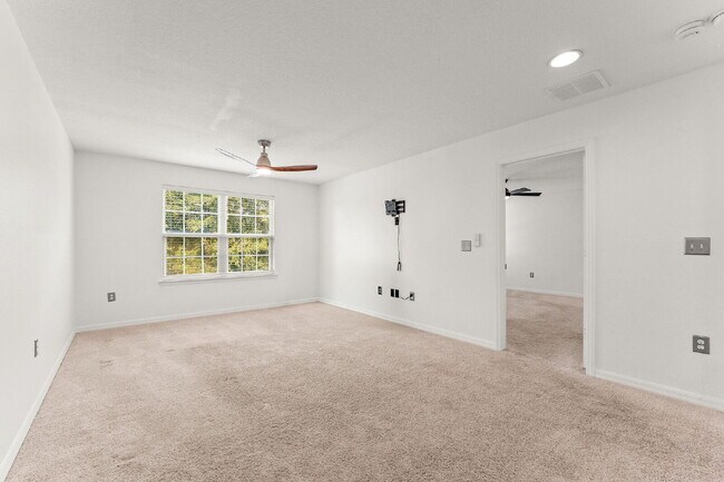 Building Photo - Spacious 3-Bed, 2.5 Bath End Unit Townhome...