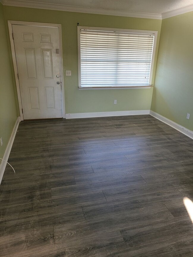 Building Photo - 1.1 New laminate flooring - looks amazing- Community Pool and Laundry facility