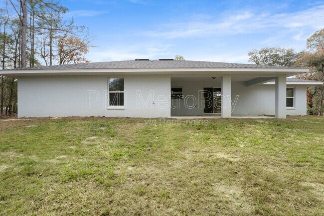 Building Photo - 9461 N Sandree Dr