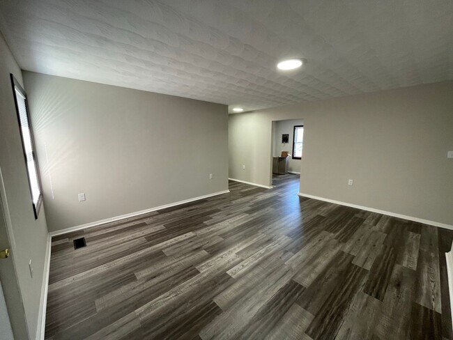 Building Photo - Oversized 3 Bedroom with laundry room!