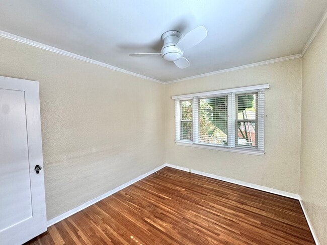 Building Photo - Cute North Park Bungalow! 2bd/1ba, 1 car garage, AC, W/D in-unit, fenced yard!