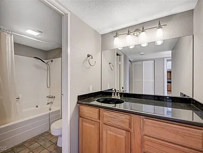 Building Photo - Enjoy resort-style living in this 2 Bed 2 Bath Condo with Stunning Strip Views in the Wimbledon C...