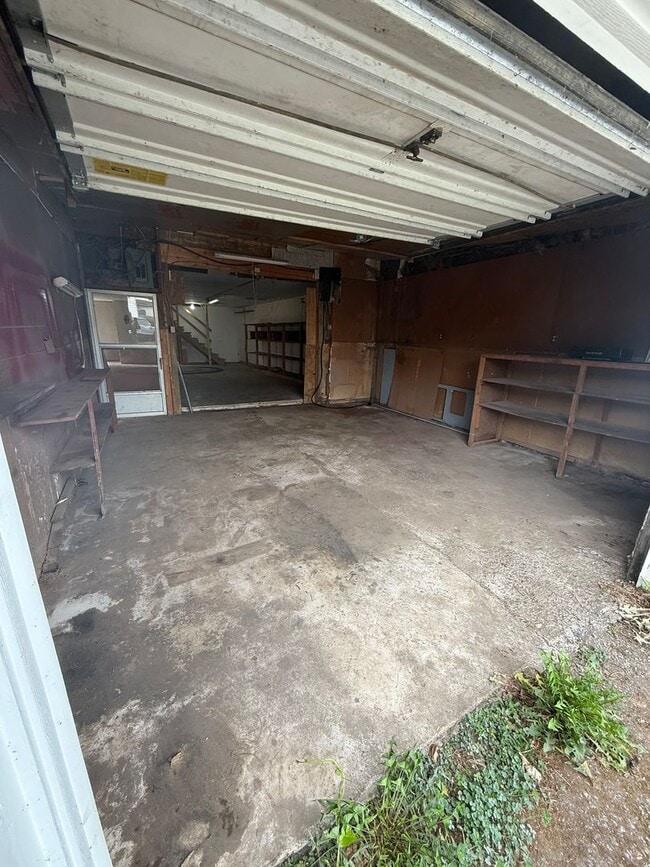 Building Photo - 2 bedroom possibly 3 with oversized Garage...