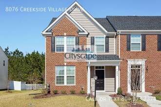 Building Photo - 8076 Creekside Village Dr