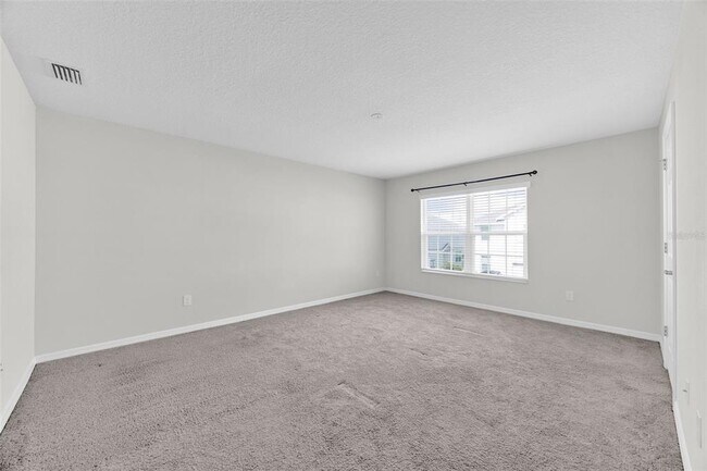 Building Photo - 6321 Tillandsia Pl