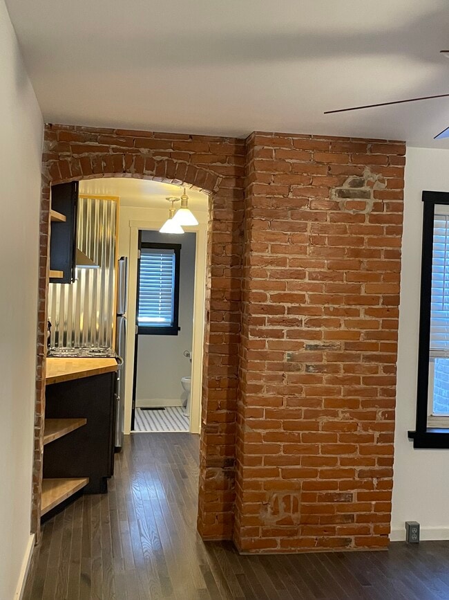 Dining room with hardwood floo - 1206 E 11th St