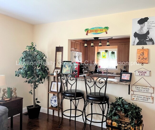 Building Photo - Charming Brick Ranch with Beautifully Land...