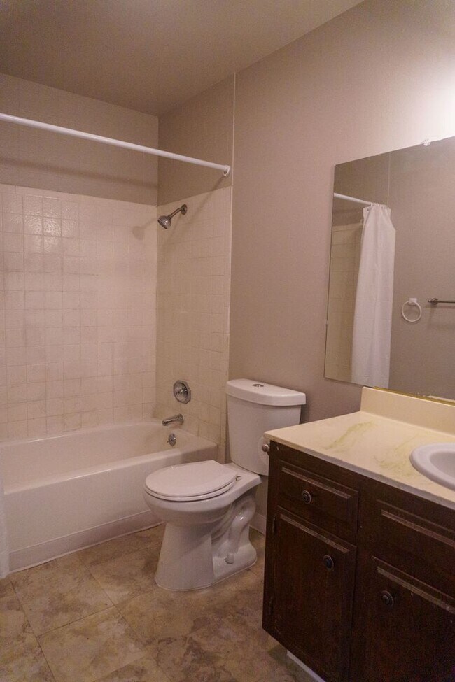 Building Photo - Spacious Three Bedroom, Two Bathroom House featuring Two Car Garage With Huge Yard