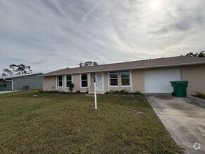 Building Photo - 3/2 with a large backyard