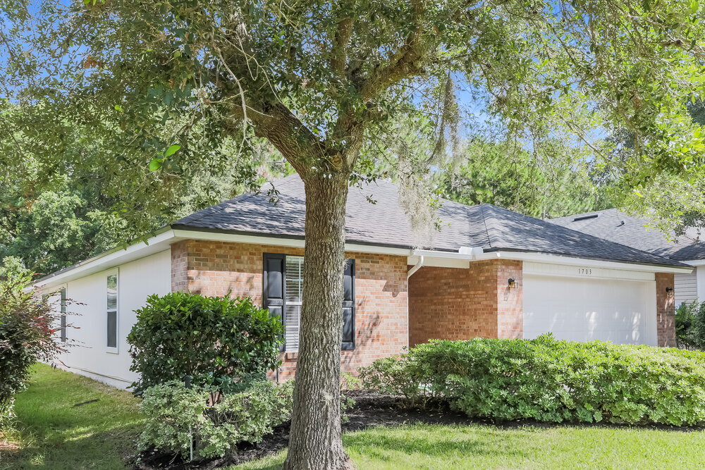 Building Photo - 1703 Canopy Oaks Dr